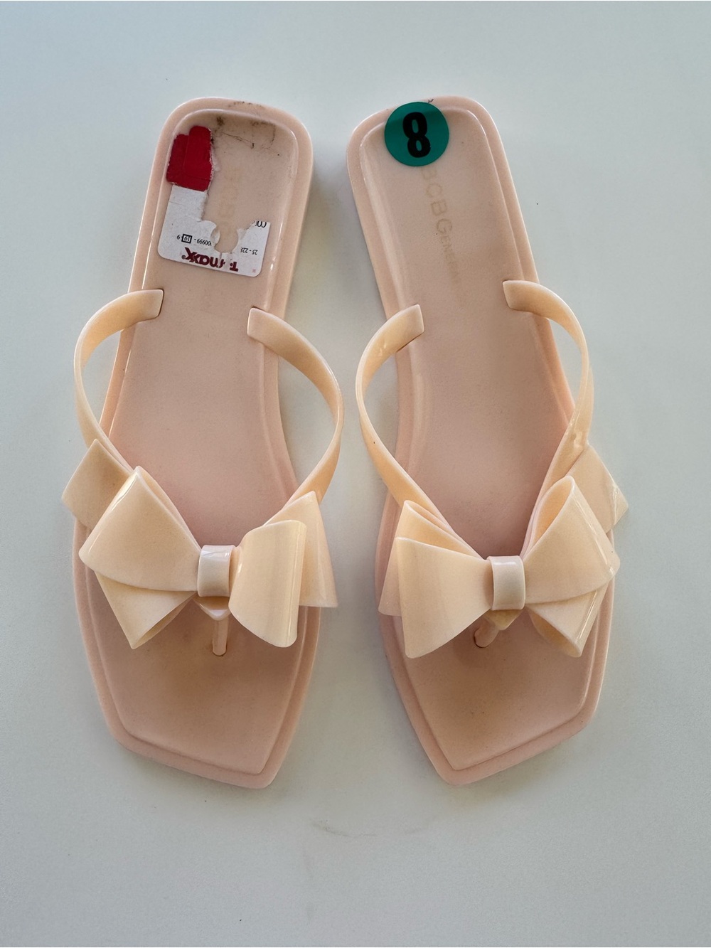 BCBG Women’s Bow Jelly Thong Sandals - Nude Pink size 8